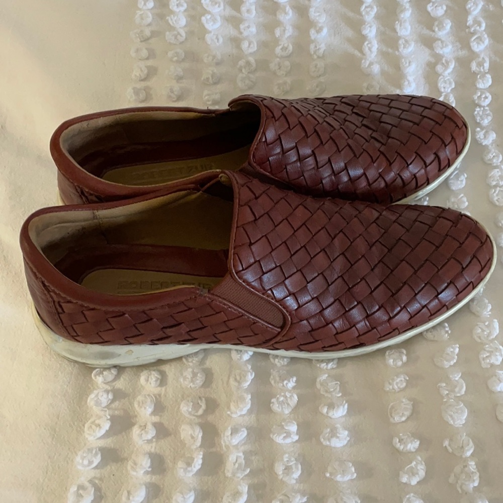 Slide on leather loafers with quilted detail.